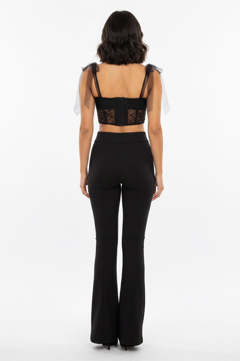 Pantalón calza Flare con cinturón