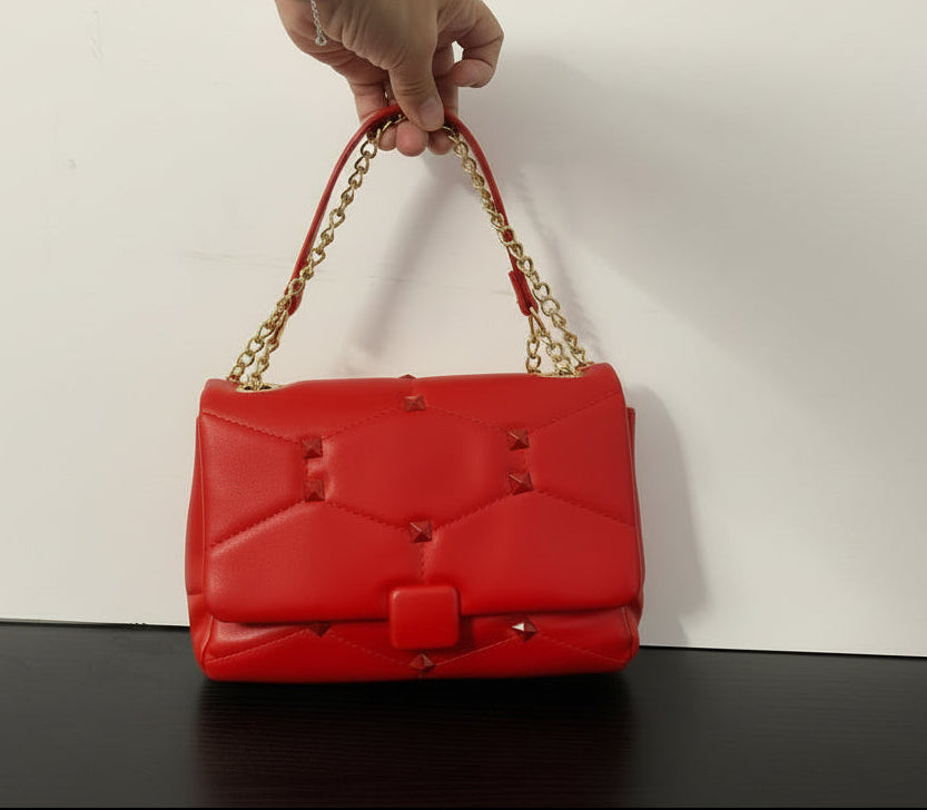 Cartera Tachas